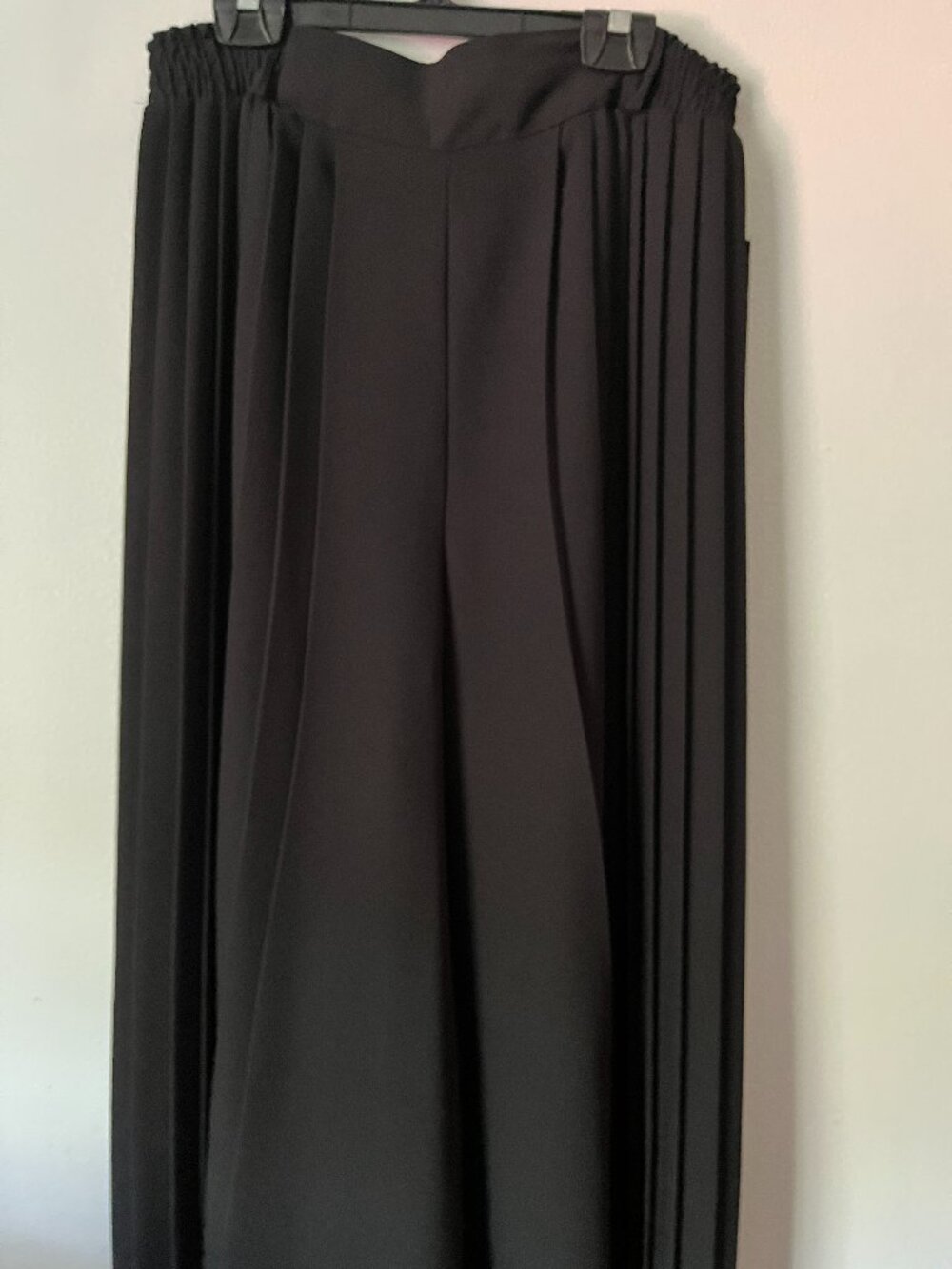 Lana Lee sophisticated black pant with very wide legs.